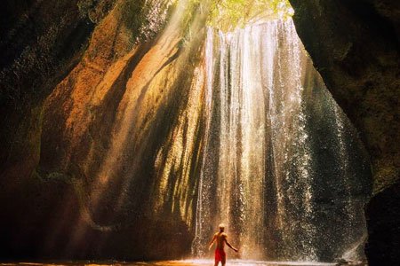 Tukad Cepung Waterfall Bathed in Morning Light